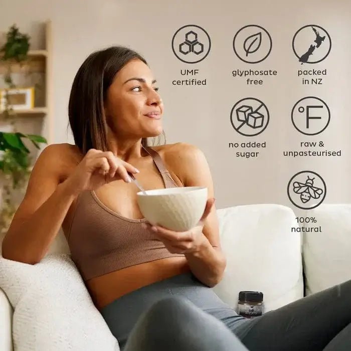 Woman enjoying UMF 10+ Raw Multifloral Manuka Honey 225g with health benefits and certifications.