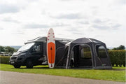 Vango HexAway Air tall awning - Drive Away next to a campervan with a paddle board.