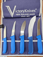 Victory Hunting Skinning Boning Knife Set Blue with blue handles arranged in a holder.