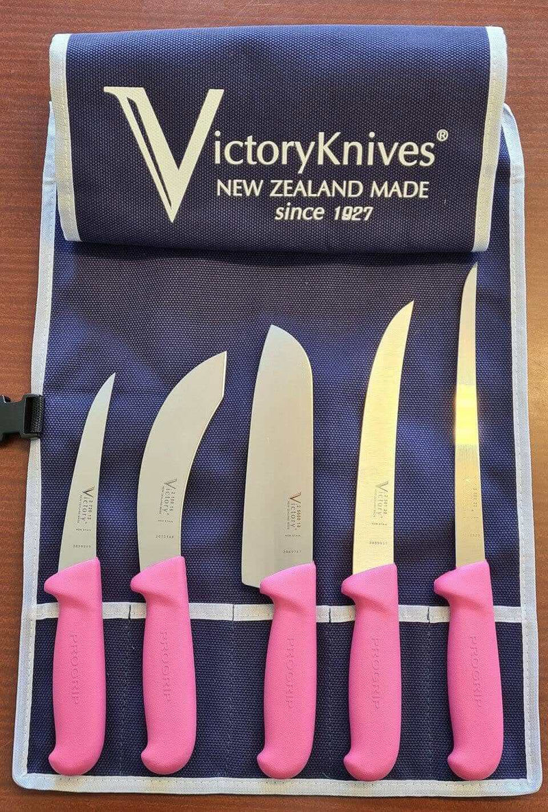 Victory Pink Knife Set featuring five pink knives in a protective roll, ideal for various kitchen tasks.