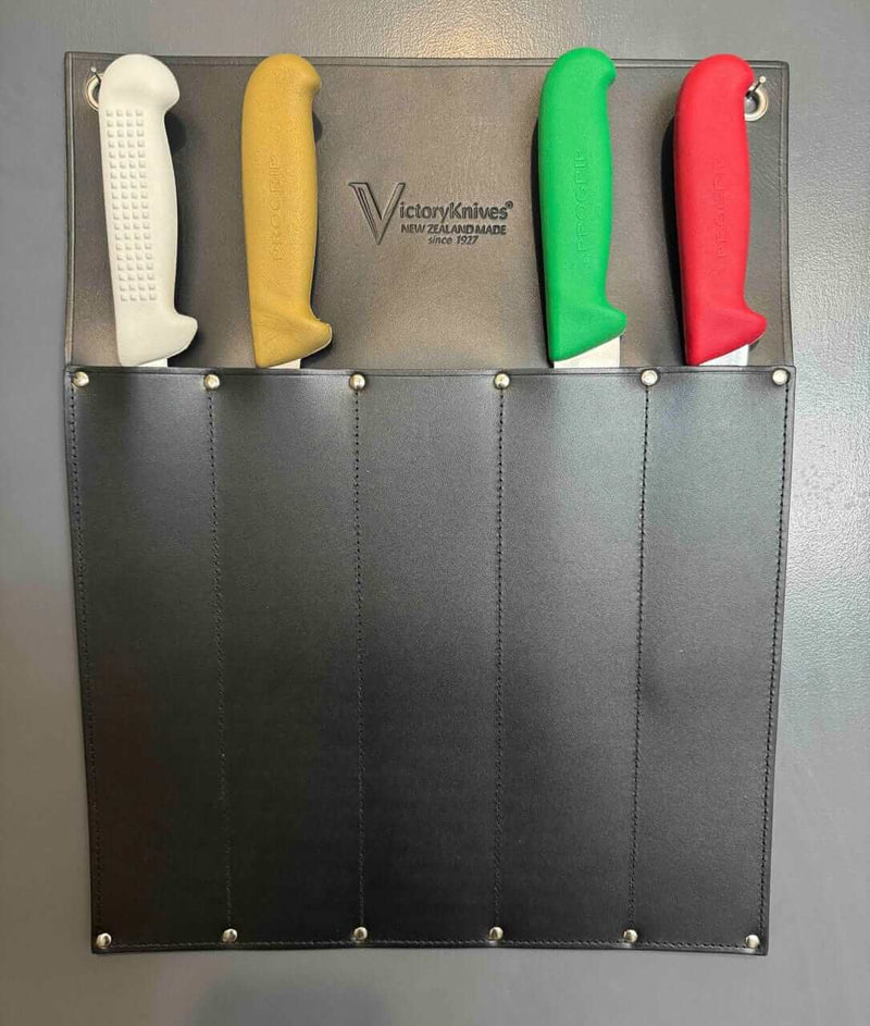 Victory Knife Safe with five knives stored safely, showcasing strong leather design for knife protection.