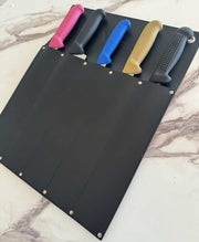 Victory Knife Safe displaying securely stored knives in a durable leather holder on a marble surface.