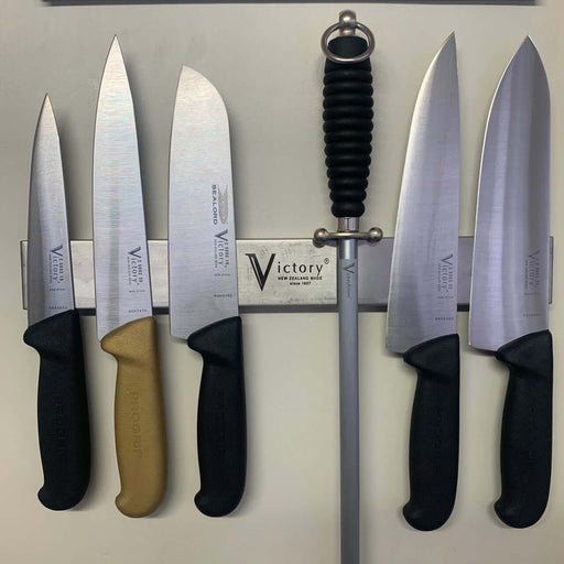 Magnetic Knife Rack 400mm Victory displaying various kitchen knives on a stainless steel rack, ideal for organized cooking.